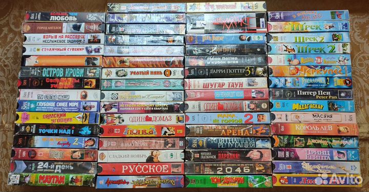 VHS кассеты с фильмами и мультфильмами