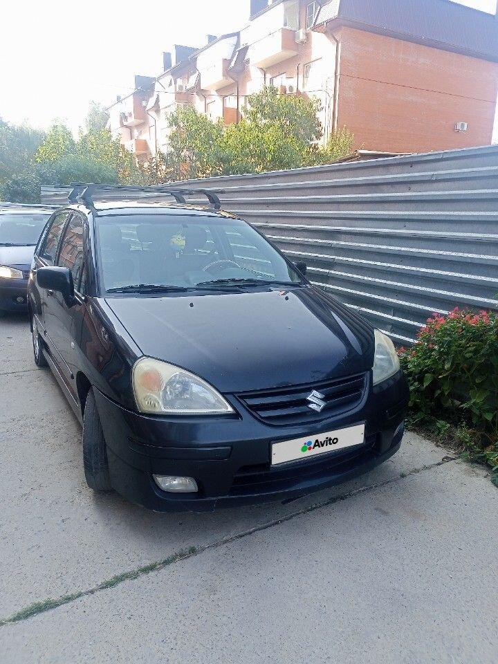 Suzuki Liana: фото владельца