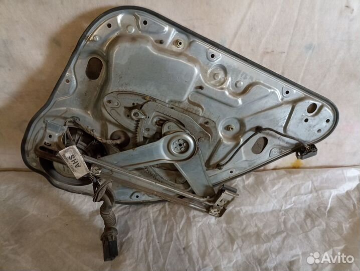 Ford Focus 2 Стеклоподъемник задний левый