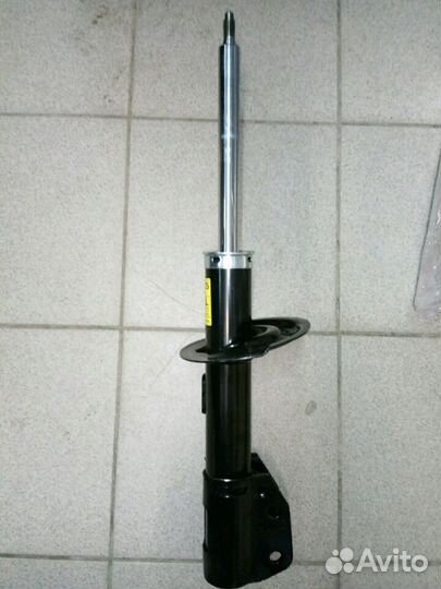 Амортизатор передний Опель Антара