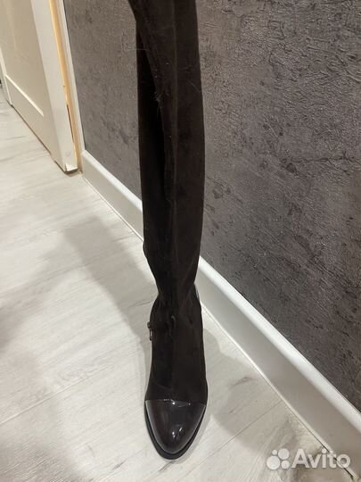 Ботинки на каблуках длинные