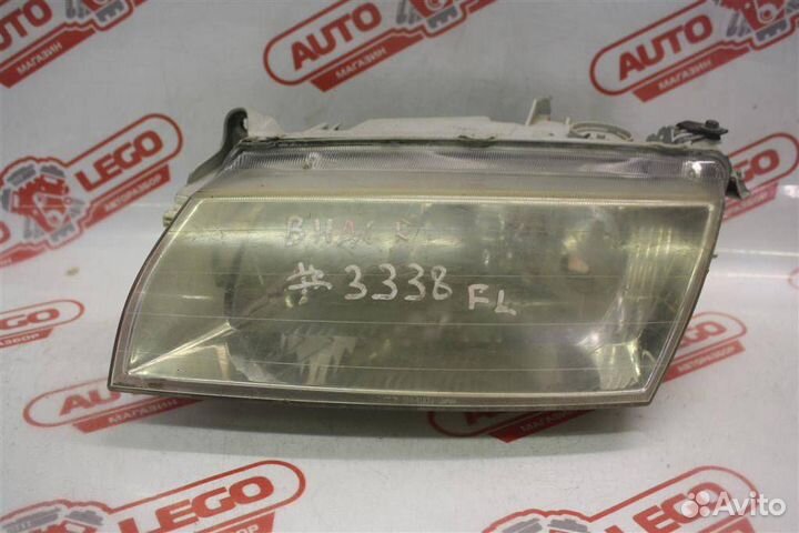 Фара левая Mazda Familia BH (1994 - 1998)