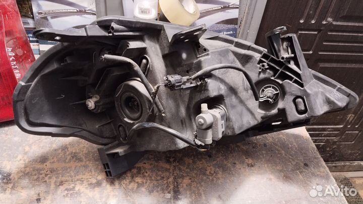 Фара передняя левая Ниссан Тиида Ц11