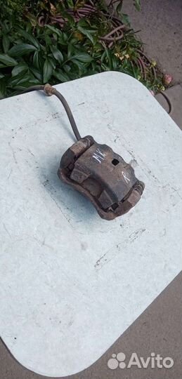 Супорт тормозной передний джили