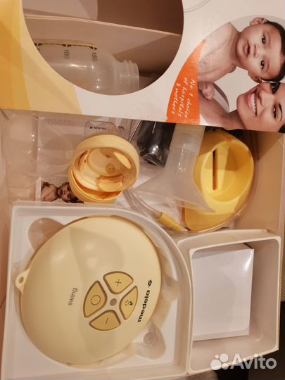 Молокоотсос medela электрический