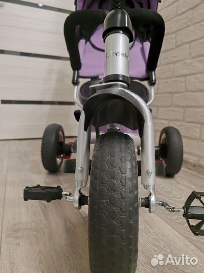 Трехколесный велосипед с ручкой