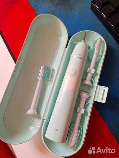 Электронная зубная щетка philips