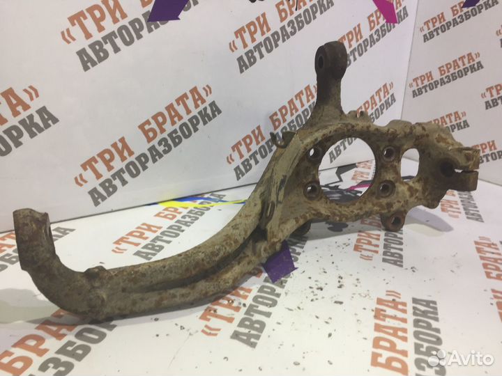 Ниссан Навара Кулак передней ступицы Лев