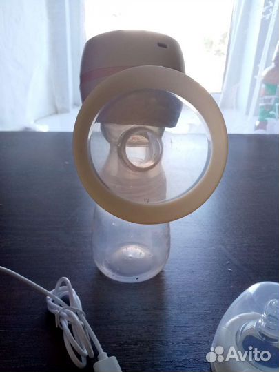 Молокоотсос электрический