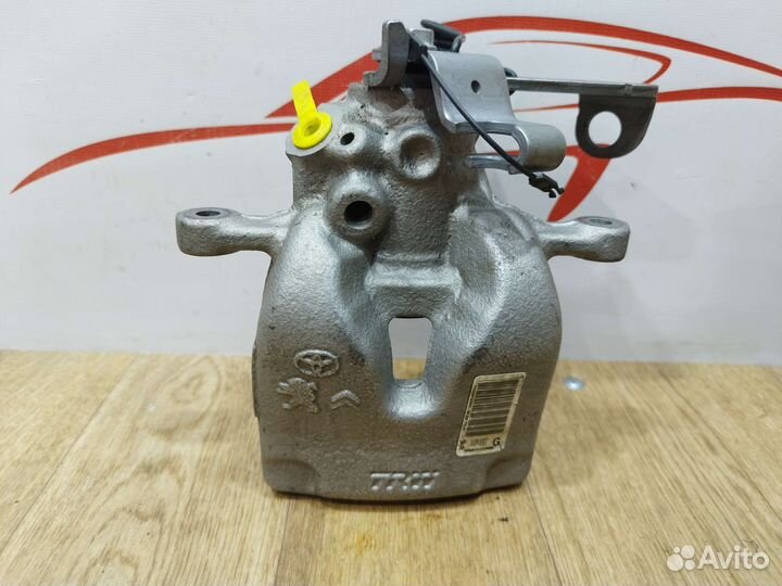 Суппорт тормозной зад LH Peugeot Citroen Toyota