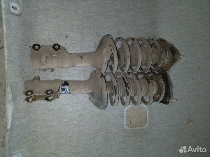 Передние стойки chery bonus