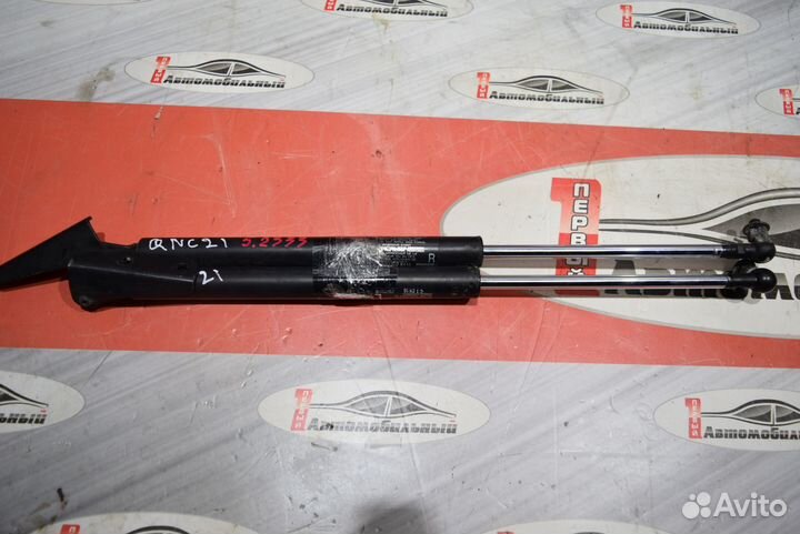 Амортизатор задней двери c Toyota bB QNC21 3SZ-VE