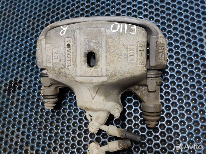 Суппорт передний toyota corolla e110