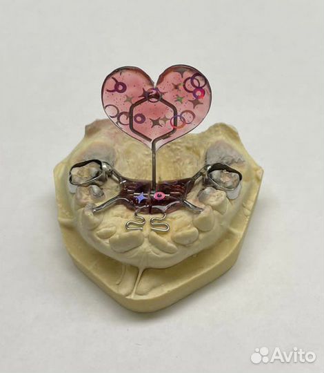 Зубной техник ортодонт