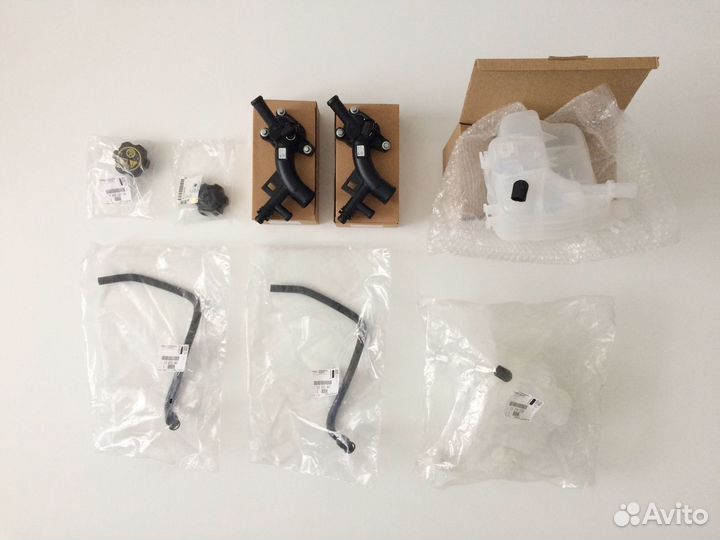 Бачок, тройник, трубка отвода газов Opel Astra J