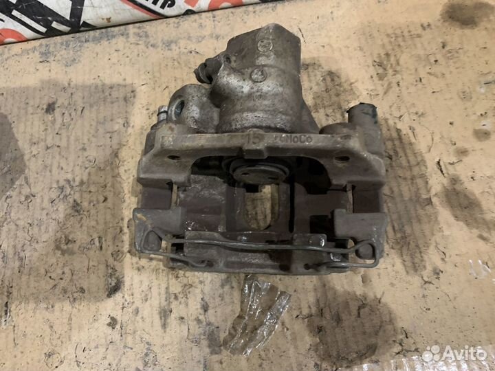 Суппорт задний левый правый Mazda 3 (BK) 2002-2009