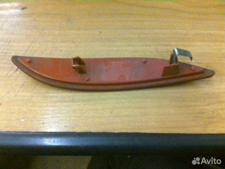 Отражатель в бампер задний левый Renault Megane 3