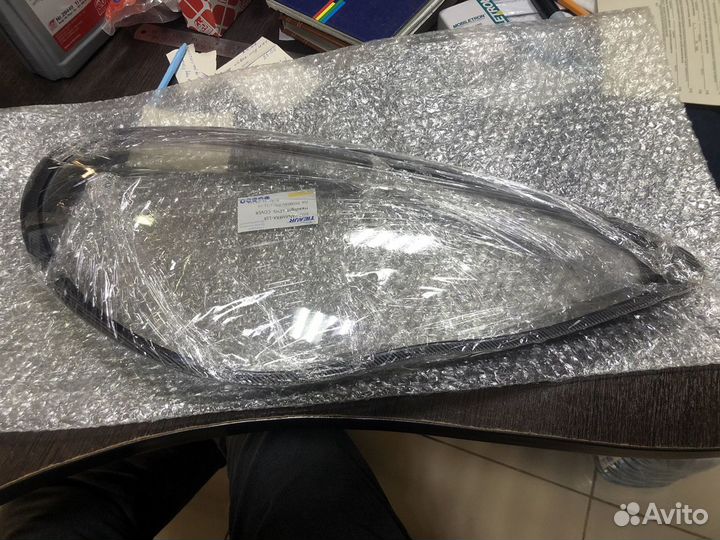 Стекло фары Panamera рест/до рест(лев прав)
