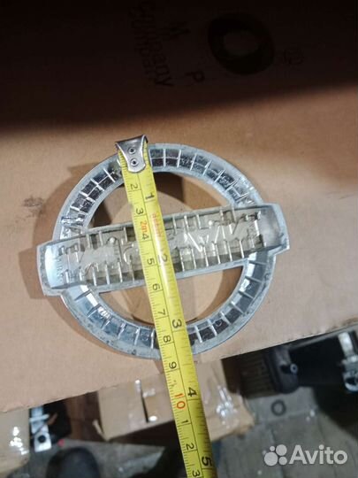 Эмблема богажника Nissan Almera Teranno