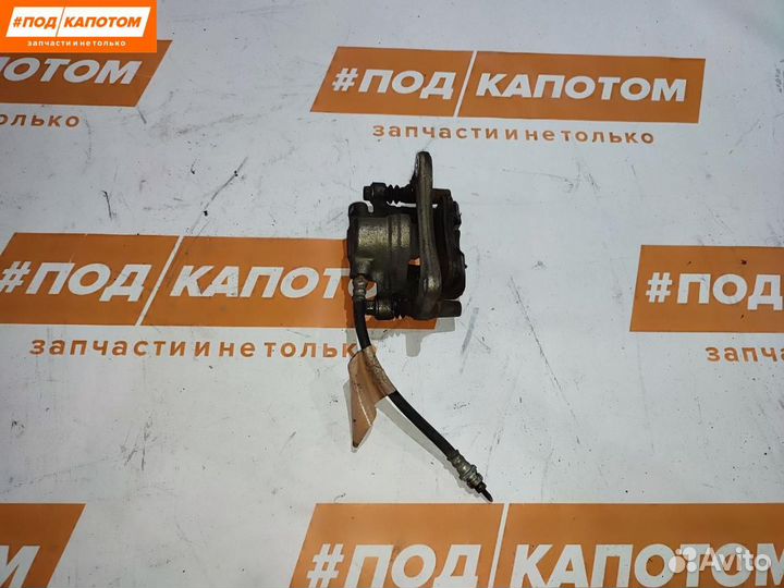 Суппорт тормозной задний правый Mitsubishi Lancer