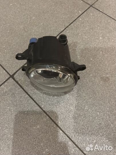 Фара противотуманная левая с рамкой