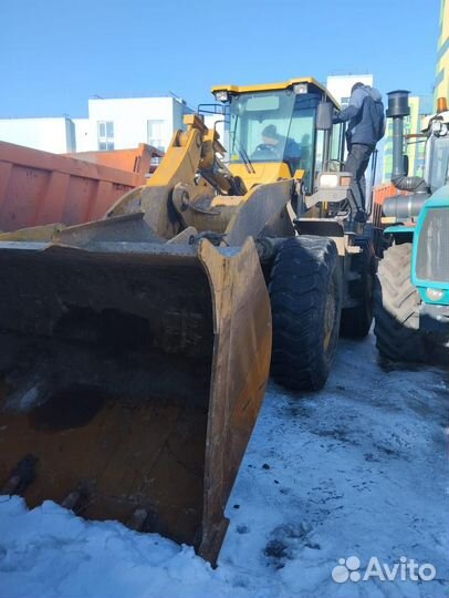 Услуги спецтехники фронтальный погрузчик