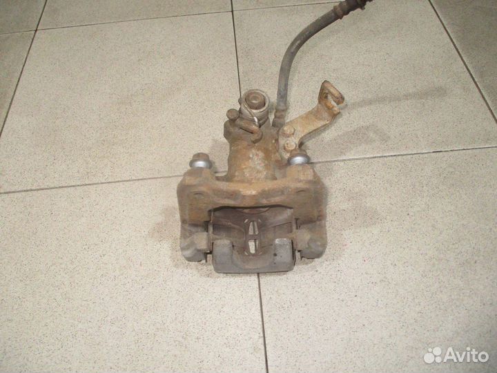 Суппорт задний левый Suzuki SX4