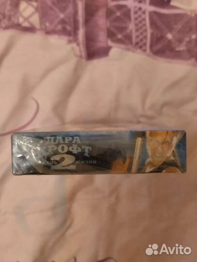 Лара Крофт 2. Анжелина Джоли. Новая видеокассета