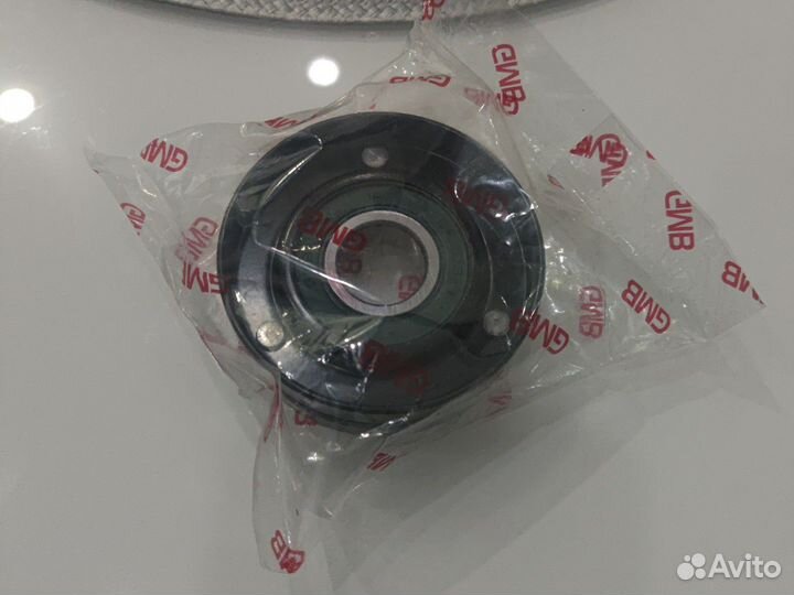 Натяжной ролик приводного ремня