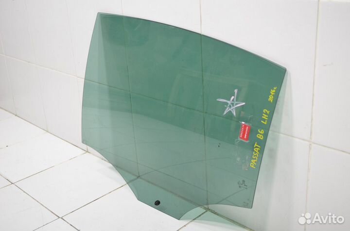 Стекло двери заднее левое Volkswagen Passat B6 2.0