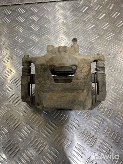 Суппорт тормозной передний левый Chevrolet Aveo