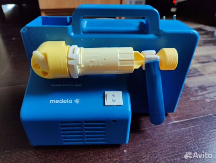 Молокоотсос medela электрический