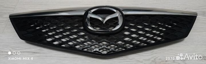 Решётка радиатора центр хром Mazda 2 кузов DY