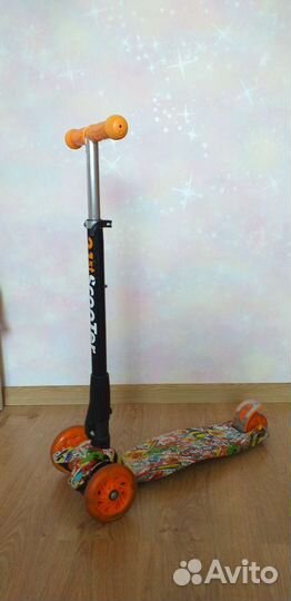 Трёхколёсный самокат