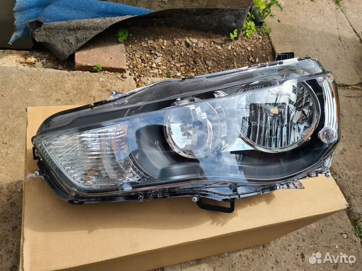 Фара левая mitsubishi outlander xl 2010 2011