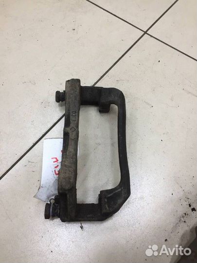 Скоба суппорта переднего левого Opel Astra