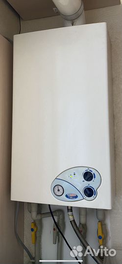 Газовый двухконтурный турбированный котел 24