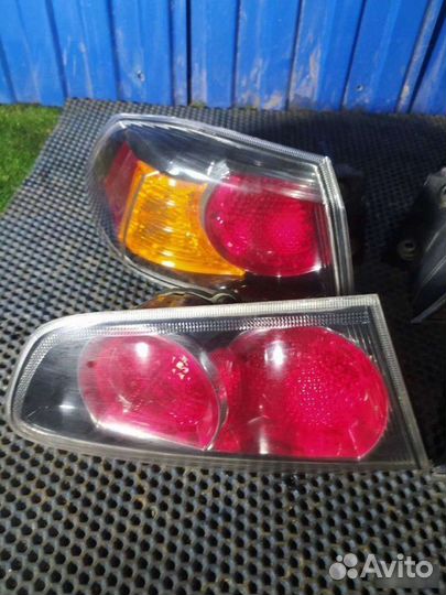 Фонарь крышки багажника Mitsubishi Lancer 10