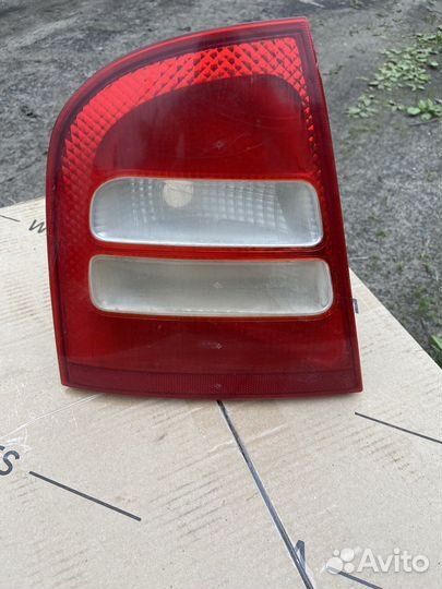 Фонарь левый Skoda Octavia A4 Tour