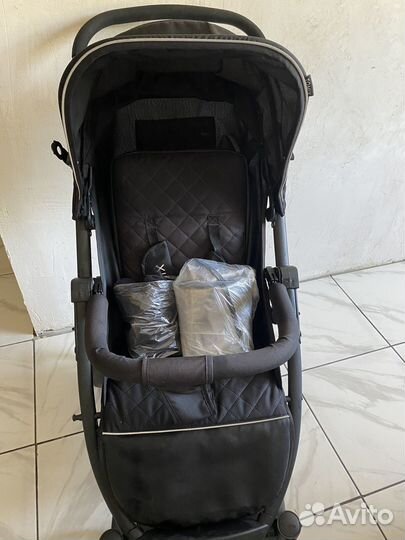 Прогулочная коляскa Tomix