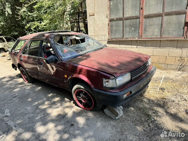 В полном разборе Nissan Bluebird 2.0 мт 1986