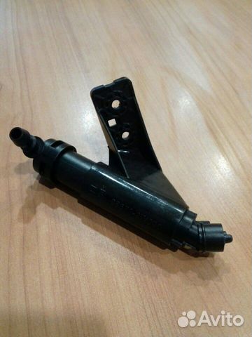 Форсунка омывателя фар левая Hyundai Santa Fe 2012