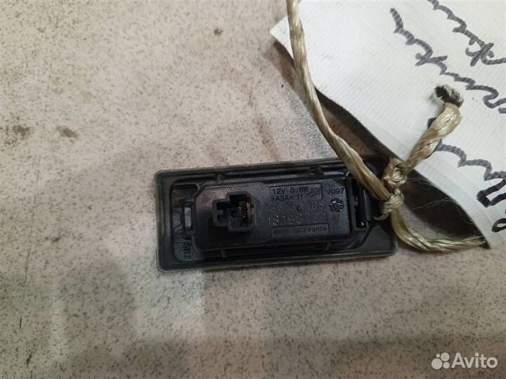 Фонарь подсветки номера Skoda Rapid 2012