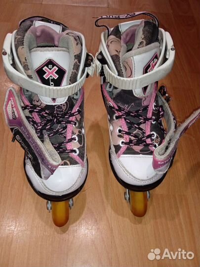 Роликовые коньки