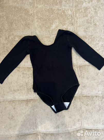 Гимнастический купальник и юбки