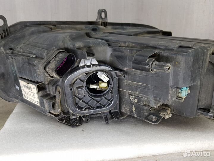 Фара левая Volkswagen Touareg