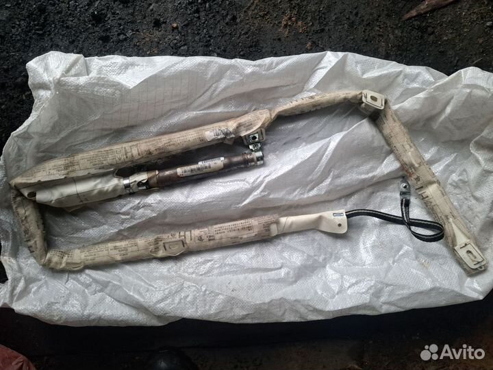 Шторка безопасности Toyota Avensis