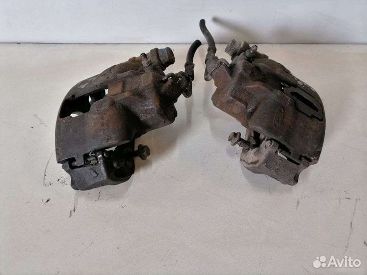 Суппорт передний Ford Escort 1995-2001