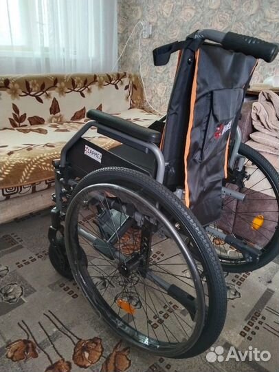 Инвалидная коляска