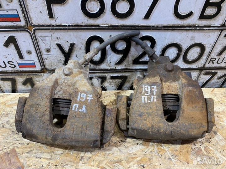 Суппорт передний Ford Focus универсал 1.8 2006